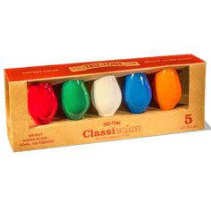 three different colored eggs in a cardboard box on a white background with the words classolor written below it