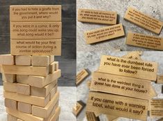 wooden blocks stacked on top of each other with some words written on them and one block in the middle