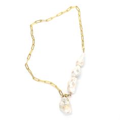 This one's a stunner. Asymmetrical style necklace featuring four sculptural AAA grade cultured baroque pearls that can be worn multiple ways. Adjust the clasp and you can wear it as a drop necklace, dramatic choker with long drop, or wrap it a few times around your wrist for an effortlessly cool bracelet. 14k gold filled. 24" long Lariat Necklace With Baroque Pearl Chain, Pearl Lariat Necklace With Chain, Baroque Pearl Lariat Necklace With Pearl Charm, Baroque Pearl Drop Necklace With Pearl Chain, Lariat Baroque Pearl Drop Jewelry, Baroque Pearl Lariat Necklace With Pendant, Pearl Lariat Chain Jewelry, Pearl Lariat Jewelry With Chain Detail, Pearl Lariat With Chain Detail Jewelry