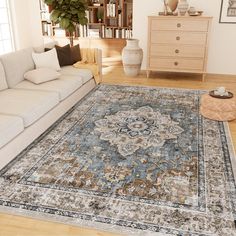 a living room filled with furniture and a large rug