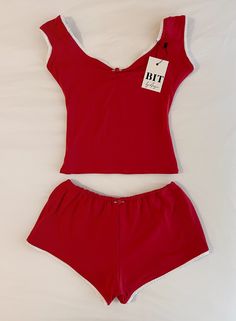 *All preorders for this item ship within 1-2 weeks! Handmade soft and stretchy baby tee and matching shorts set with elasticized waistband Ruched neckline Slightly cropped fit and fully hemmed Shorts and front part of top are double lined and not see through, back of top is single layered Model is wearing a size S Free U.S. shipping! Cute Pajamas Sets, Bedroom Outfit For Women, Shorts Matching Set, Cute Summer Sets, Shorts Set Two Piece, Pink Matching Set, Pj Sets Women, Shorts Set, Cute Gym Sets