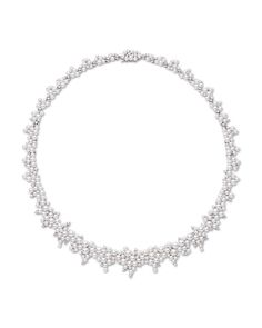 Paul Morelli necklace from the Lagrange Collection. 18-karat white gold. Small Akoya cultured pearls, natural color. Pave round white diamonds. 2.32 total diamond carat weight. Approx. 15.8"L. Fishhook clasp.