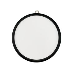 a black and white round object on a white background