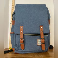 Mancio Laptop Backpack. Comes With A Cord. Lots Of Pockets. Blue. New. Never Used. Light Blue Backpack With Zipper For Everyday Use, Blue Large Capacity Backpack For Travel, Large Capacity Blue Backpack For Travel, Blue Backpack For Daily Use With Zipper Closure, Blue Backpack With Zipper For Daily Use, Blue Backpack With Zipper Closure For Daily Use, Blue Backpack For Everyday Use And Back To School, Everyday Blue Backpack With Zipper Closure, Blue Backpack For Everyday And Back To School