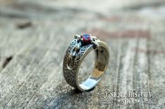 This ring is the unique and original design of Unique History Shop brand. Can't be found in any other Etsy stores! This is a unique handmade ring Metal: 925 silver, sterling silver Weight: 6 g (depends on size) Made with Cubic Zirconia Semi-precious Stone Lead, nickel, cadmium free & hypoallergenic Color the same as pictures Great Details Made-to-order We can make it in any size you need! (check options) Dear customer, if you have any questions - don't hesitate to contat me! :) Unique Hand Forged Engraved Promise Ring, Unique Handmade Engraved Promise Ring, Unique Engraved Promise Ring, Unique Sterling Silver Jewelry With Tension Setting, Unique Jewelry With Tension Setting For Gift, Unique Jewelry With Tension Setting As Gift, Vintage Tension Setting Ring Jewelry, Vintage Jewelry With Tension Setting As A Gift, Unique Hand Forged Engraved Ring For Gift