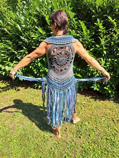 Blue Sleeveless Vest For Festival, Bohemian Fitted Sleeveless Vest, Fitted Bohemian Sleeveless Vest, Hippie Style Fitted Sleeveless Vest, Fitted Sleeveless Hippie Vest, Fitted Blue Vest For Festival, Bohemian Fitted Vest For Festival, Fitted Bohemian Vest For Festivals, Fitted Bohemian Blue Vest