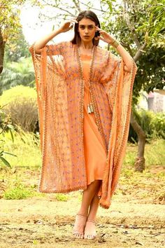 Shop for Surbhi Gupta Peach Georgette Embroidered Dress With Kaftan for Women Online at Aza Fashions Latest Kaftan Designs, Kaftan Dress Modern, Georgette Kaftan, Printed Kaftan, Pakistani Formal Dresses, Kaftan Designs, Pakistani Fashion Casual, Fashion Top Outfits, Trendy Dress Outfits