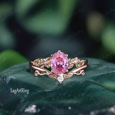 Oval cut Pink Sapphire Engagement ring Rose Gold Promise Ring Leaf Nature Inspired Bridal Ring Sep Birthstone Gemstone Ring  Jewelry gifts Ring Details: - Theme:Romantic Wedding & Engagement - comfortable band - Stone:6*8mm lab created pink sapphire Side stones: Peridot - Total weight: 0.07 ctw (High Quality) - ring band width :1.5mm - ring thicknesses:1.2mm Wedding Band:0.035ctw Stones: lab created moissanite - ring band width :1.3mm - ring thicknesses:1.3mm - Metal choose:10k or 14k or 18k ros Pink Gold Open Ring Jewelry For Wedding, Oval Rose Gold Rings With Gemstone Accents, Rose Gold Rings With Gemstone Accents As Gift, Gift Rose Gold Rings With Gemstone Accents, Pink Diamond Ring With Gemstone Accents For Gift, Pink Sapphire Ring With Gemstone Accents As A Gift, Pink Emerald Ring For Gift, Fine Jewelry, Oval Pink Gold Promise Ring, Pink Emerald Ring Fine Jewelry Gift