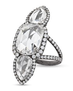 an oval and pear shaped diamond ring