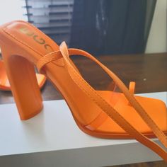 Fits More Like 8 1/2-9 Shoe,Never Worn,Wrap Around Ankle. Orange Synthetic Heels With Round Toe, Orange Synthetic Round Toe Heels, Casual Orange Heels For Spring, Orange Block Heels With Wrapped Heel, Casual Orange Heels For Party, Orange Open Toe Heels With Wrapped Heel, Casual Orange Ankle Strap Heels, Casual Orange Heels, Orange Block Heel Casual Heels