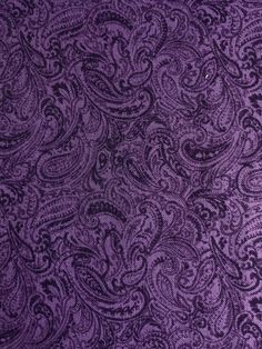 an image of purple paisley fabric