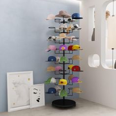 PRICES MAY VARY. 100% Unknown Freestanding Display Rack: Stylish and versatile hat stand made of durable metal with a classic black/gold finish. Available in 6, 7, or 8 tiers, accommodating up to 30 hats, 35 hats, or 40 hats. Keep Hat's Shape: Loop design hooks maintain hat shape, suitable for a variety of hat styles and accessories. With a sturdy base, the hat rack display ensures stability and long-lasting durability. Movable: The freestanding hat rack stand with swivel rolling wheels can be placed anywhere, making it ideal for home, retail stores, trade shows, waiting areas, or any location where hats need to be stored. Perfect Display Multiple Hats: This hat organizer is perfect for displaying and organizing a wide variety of hats, including fedoras, cowboy hats, baseball caps, summer Hat Display Ideas Craft Show, Hat Organizer, Hat Racks, Hanging Hats, Hat Stand, Hat Display, Hat Holder, Hat Organization, Hats Baseball Caps