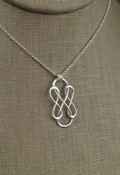 Triple infinity necklace in sterling silver, sterling silver necklace, infinity, eternity necklace, friendship, mother's day A sterling silver triple infinity symbol link that measures 1.18 x 0.59 inches (30 x 15mm) is suspended from a sterling silver chain with 3 jump rings and the chain can be any length up to 22 inches. It is secured with a sterling silver spring ring clasp. Your purchase will arrive in a jewelry box ready for gift giving or as a gift for yourself! Enter my shop here: jersey6 Artistic Tattoos, Outlander Jewelry, Eternity Necklace, Necklace Friendship, Necklace Infinity, Infinity Wedding, Infinity Tattoos, Infinity Jewelry, Friendship Necklaces