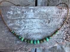 ✦Gorgeous handmade and eye catching, picasso Czech glass opaque beads in a variety green and turquoise, single strand short style necklace, copper plated brass spacer, antique plated copper clasp with extension chain is a delight. ✦ I have created this piece with inspiration from tribal cultures around the world, while adding a modern unique feel. ✦Length of necklace 43cm (17") approximately, plus a 4.5cm (1 3/4") extension chain. ✦ 100% artisan made. Cheap Green Bohemian Turquoise Necklace, Earthy Turquoise Necklaces For Festivals, Earthy Turquoise Festival Necklaces, Bohemian Beaded Choker Necklace, Handmade Bohemian Choker Necklace, Bohemian Festival Choker With Adjustable Chain, Hippie Festival Pendant Necklace, Hippie Beaded Pendant Jewelry, Hippie Style Beaded Pendant Jewelry