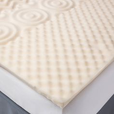 the mattress is made up and ready for someone to use it in their home or office