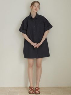 Cut from structured cotton fabric, this oversized shirt dress has wide short sleeves and mini length hem. Roll up the cuffs to accentuate the cute, casual mood. - Intended for a loose fit- Classic open collars and button fastenings through front- Casual chest pocket- Comfortable dropped shoulders- Simple, refined feel Relaxed Fit Shirt Dress With Rolled Sleeves For Work, Short Sleeve Shirt Dress With Roll-up Sleeves For Daywear, Cotton Shirt Dress With Rolled Sleeves, Oversized Short Sleeve Workwear Dress, Oversized Short Sleeve Dresses For Work, Chic Short Sleeve Shirt Dress With Rolled Sleeves, Summer Shirt Dress With Cuffed Short Sleeves, Short Sleeve Shirt Dress With Cuffed Sleeves For Daywear, Oversized Short Sleeve Shirt Dress With Rolled Sleeves