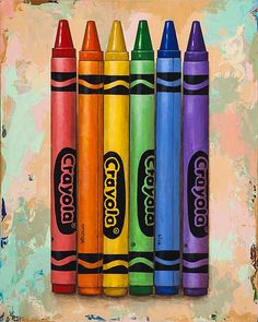 several crayons are lined up in a row