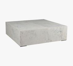 a square white marble table with black metal legs on an isolated surface, viewed from the front