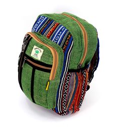 A versatile and beautiful 100% Hemp Multi-pocketed Backpack made with 100 percent natural THC-free Himalaya hemp. Stitched and assembled by the most talented artisans in Nepal. The product is double stitched with the highest quality Himalaya hemp. The product consists of double zippers while also having completely adjustable shoulder straps which ensures that the bag is one size fits all product. This double-strapped backpack is a product that consists of various compartments which can be of mul Green Standard Backpack For Trip, Green Backpack For Trips, Green Standard Backpack For Trips, Green Backpack For Trip, Casual Green Backpack For Trips, Casual Green Bag For Trips, Green Backpack With Pockets, Green Cotton Backpack For Daily Use, Green Backpack With Zipper Pocket For Daily Use