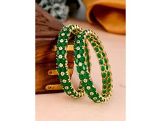 Elevate your elegance with our Designer 2 Pair Bangles. Crafted with exquisite CZ and emerald green gold accents, these bangles radiate sophistication. Each piece adorned with American diamonds, they exude luxury and charm. Perfect for adding a touch of glamour to any ensemble, a must-have for your jewelry collection. Bangles Se (2 Pc) Sizeable Bangles Crystal Stone *SHOP LINK - https://www.etsy.com/shop/ColourstoneWorld?ref=profile_header * PERFECT GIFT FOR LOVED ONES DELIVERY UPGRADE AVAILABLE IF YOU HAVE ANY QUESTIONS PLEASE FEEL FREE TO ASK We Can Take Custom Orders Also As Per Your Requirement. ColourstoneWorld Jewelry Pieces Can Be Customized As Per Your Requirement. SHOP LINK - https://www.etsy.com/shop/ColourstoneWorld?ref=profile_header Afghani Jewelry - https://www.etsy.com/shop/ Indian Bangle Bracelets, Afghani Jewelry, Gold Bangles Indian, Wedding Jewelery, Bangles Indian, Profile Header, Crystal Bangle, Jewelry Crystal, Hindu Wedding