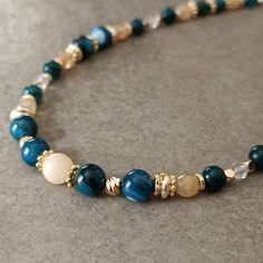 "Elegant Blue Bead Necklace Women ☆ Delivery in 1-4 working days! ☆ Arrives ready for gifting and usually ships same day or next day. The necklace will be sent with a gift! O T H E R ∙ I N F O R M A T I O N Blue Agate size: 8mm Beige Agate size: 8mm Blue Apatite size: 5-6 mm Beige Citrine size: 5-6 mm Clear Quartz size: 3 mm **Intermediate apparatus and beads are non-tarnish gold plated. Length: The length shown on our models are 16\" and 18\" you may select 14-30\" from the drop down menu provided. If you want a size change, please contact us or leave us a message. :) ☆ Each of our necklaces at PEARLOWNJEWELRY are handmade and special natural stones. Necklace is made with positive energy. Each crystal is cleaned before shipment. We update the stock amount according to the custom of stones Luxury Blue Beaded Necklace Gift, Blue Faceted Beads Jewelry For Healing, Blue Crystal Necklaces With Polished Round Beads, Blue Crystal Necklace With Polished Round Beads, Sapphire Beaded Necklaces With Gemstone Beads For Gift, Sapphire Beaded Necklaces As A Gift, Blue Polished Beads Spiritual Crystal Necklace, Sapphire Beaded Necklace For Gift, Blue Spiritual Crystal Necklace With Polished Beads