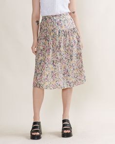 ROMANTIC MIDI SKIRT WITH PASTEL FLORAL PATTERN SIZE S WAIST MEASURED 13.5IN Material unknown, seems to be cotton  Model usually wears size S/M and is 168cm tall.  Great condition, keep in mind that it is used item and signs of natural wear/age might appear, check pictures for more. If you have any questions about item don't hesitate to message us. When buying from HungerVintage you support small sustainable business.  Thank you! Floral Print Cotton Midi Skirt, Cotton Midi Skirt With Floral Print, Relaxed Cotton Floral Print Skirt, Cotton Floral Print Relaxed Skirt, Cotton Floral Print Knee-length Skirt, Knee-length Cotton Skirt With Floral Print, Vintage Cotton Midi Skirt, Cotton Floral Print Midi Skirt, Retro Cotton Summer Skirt