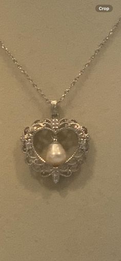 White teardrop shape freshwater pearl Silver colored chain 18" + 2" extension = 20" total Heart "lace" design Zircon embellishments Lobster clasp  N-69 Lace Heart, Pearl Pendant Necklace, Etsy Jewelry, Lace Design, Silver Pearls, Pearl Pendant, Pendant Necklaces, Lobster Clasp, Silver Color