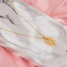 💕🍀Welcome! In the real world of gold jewelry, we present a piece that will immortalize your special moments: Gold Four-Leaf Clover Necklace.    🌟 Add a little bit of magic to your everyday look with our Gold Clover Leaf Necklace! This charming four-leaf clover is not just a symbol of beauty, but also of luck, making it the perfect accessory for those who love timeless elegance. Whether you're heading to a special occasion or want to enhance your daily style, this stunning gold shamrock pendant is sure to turn heads.    🍀 Each leaf of the clover is believed to represent something special—faith, hope, love, and luck. Wearing this four-leaf clover necklace is a wonderful way to keep these values close to your heart while adding a touch of sophistication. Crafted from premium 14K gold, it Gold Flower Pendant Jewelry For Wedding, Gold Clavicle Chain Jewelry As A Gift, Gold Wedding Jewelry Gift, Gold Flower Shaped Jewelry For Valentine's Day, Gold Flower-shaped Jewelry For Valentine's Day, Tarnish Resistant Flower Pendant Jewelry Gift, Valentine's Day Yellow Gold Jewelry With Flower Pendant, Valentine's Day Yellow Gold Flower Pendant Jewelry, Gold Dainty Jewelry For Gifts