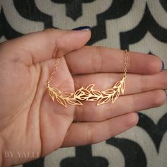 Vine Necklace – Minimalist necklace Featuring leaves branch outlines simple and elegant, this necklace will be sure to spruce up any outfit . ★ Comes in our signature gift box, ready for gift giving. ★ Available in Gold [18k gold-filled chain & gold plated brass pendant] ★Pendant size : 0.40"x2.20" . Thanks for shopping at ... Vine Necklace, Leaves Necklace, Jewelry Design Studio, Gold Leaf Necklace, Meaningful Necklace, Mountain Jewelry, Branch Necklace, Nature Necklace, Christmas Gift For Mom