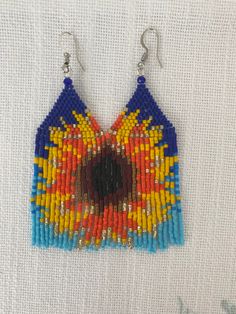 These beautiful little earrings are works of art. They are 3 inches long and will add a bright vibrant look to any outfit. The Fringe will create movement with each step you take! Yellow Fringe Earrings For Summer, Summer Festival Beaded Fringe Earrings, Summer Orange Beaded Fringe Earrings, Bohemian Orange Fringe Earrings, Yellow Fringe Dangle Jewelry, Little Earrings, Summer Boho, The Fringe, Boho Summer