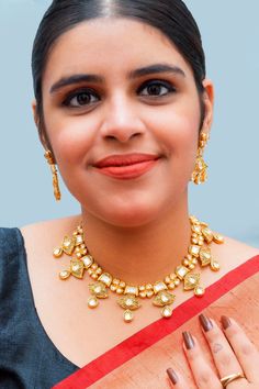 Description: Elegant and charming Gold Plated Royal Kundan Necklace Set. This is a stylish set in a golden tone. This set will work well with traditional, formal, and western formal. This is a finely detailed set, that will make you stand apart from everyone in the room. About: Eye-catching and unique jewelry that will set you apart. Gift this piece to a loved one and see their face light up with joy. Best for gifting or for personal use, wear it to any occasion and become the spotlight. Jewelry Western Formal, Western Gowns, Kids Handicraft, Saree Petticoat, Saree Jewellery, Kundan Necklace Set, Silver Pooja Items, Glass Bangles, Cocktail Dress Prom