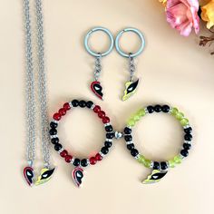 【If you customize in bulk, please give me a private message and I will give you a big discount!!】 Deadpool Jewelry Series  Bracelet: Made of high-quality alloy material, sturdy and durable. The bracelet is meticulously carved with the classic symbol of Deadpool, with delicate lines and vivid colors. The unique design style is suitable for daily wear and can also showcase your love for Deadpool in special occasions. Key buckle: The small and exquisite keychain is also themed around Deadpool eleme Black Themed Jewelry For Valentine's Day, Themed Black Jewelry For Valentine's Day, Customized Themed Jewelry For Friendship, Personalized Themed Red Bracelets, Themed Personalized Red Bracelets, Themed Red Bracelet For Friendship, Customized Black Themed Jewelry, Customized Themed Black Jewelry, Customized Black Jewelry For Valentine's Day