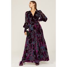 Purple floral velvet (80% Viscose, 20% Nylon). Wrap. Long sleeves. V-neck. Tie closure. 58" from shoulder to hemline. Imported. Velvet V-neck Dress For Fall, V-neck Velvet Dress For Fall, Fall Velvet V-neck Dress, Fitted Velvet Maxi Dress For Fall, Fall Fitted Velvet Maxi Dress, Fitted Velvet Dresses With Floral Print, Fall Evening Maxi Dress With Floral Print, Velvet Maxi Dress For Fall, Winter Evening Dress With Floral Print