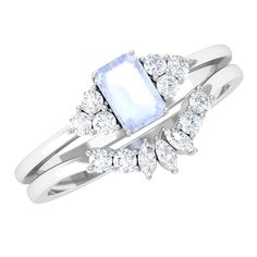 Product Details Get this amazing Wedding Ring Set for your special person. Embellished with Emerald Cut Moonstone secured in 4 Prong Setting while Marquise and Round Diamonds add a touch of sparkle and elegance. The Moonstone Ring Set makes an excellent type of ring that will elevate any outfit with ease. Make her feel out of this world with this Solitaire Ring Set. Product Information SKU SHP-RINGS032218993 Weight 3.04 gm (Approximate) MOONSTONE INFORMATION No.of Stones 1 Pieces Total Weight 0.60 Carat (Approximate) Dimension(approx) Emerald Cut-4X6 mm-1 Pcs Color light blue Cut Brilliant Shape Emerald Cut Setting Type Prong-Setting Quality Grade AAA DIAMOND INFORMATION No.of Stones 13 Pieces Total Weight 0.63 Carat (Approximate) Dimension(approx) Marquise-1.50X3.00 mm-3 PcsRound-2X2 mm-1 Solitaire Ring Set, Wedding Ring Set, 18k Yellow Gold Ring, Moonstone Ring, Types Of Rings, Out Of This World, Special Person, Wedding Ring Sets, Yellow Gold Rings