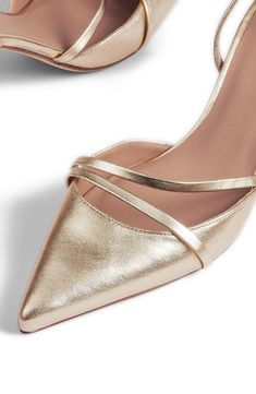 Take your special-occasion style to the next level with this pointy-toe slingback strap in a shimmering metallic finish. 2 3/4" heel (size 39) Elasticized slingback strap Leather upper and lining/synthetic sole Made in Spain This brand is certified with the Butterfly Mark, which identifies luxury brands that adhere to social and environmental best practices This brand meets Nordstrom Responsible Brands criteria: brand adheres to responsible social and environmental practices Luxury Slingback Pumps With Gold-tone Hardware For Party, Luxury Slingback Pumps With Gold-tone Hardware For Evening, Luxury Gold-tone Hardware Slingback Pumps For Formal Occasions, Luxury Slingback Pumps With Gold-tone Hardware, Luxury Slingback Heels With Gold-tone Hardware, Lk Bennett, Cute Heels, Luxury Brands, Slingback Pump