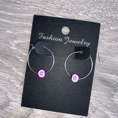 🌸 lilac miracle bead earrings🌸  ♥️Catches the light to give off a glow!  ♥️Perfect for nights out or even holidays!  ♥️£3  ♥️Shown on 20mm hoop  ♥️ earrings are silver plated and not real silver The colour may vary slightly due to most images being taken under direct sunlight or with flash to show you the full effect of the beads x  White beads may appear grey/silver when opened in a dark room. The full effect of the beads will shine through in different lights. Please note: Buyer pays for any return postage/ exchange postage x Trendy Luminous Jewelry For Gifts, Purple Hoop Earrings As Gift, Purple Hoop Jewelry For Gift, Adjustable Purple Hoop Earrings, Adjustable Purple Round Hoop Earrings, Adjustable Small Purple Hoop Earrings, Luminous Jewelry For Gift, Nickel-free Purple Hoop Earrings, Adjustable Nickel-free Purple Hoop Earrings