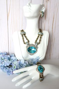 HEIDI DAUS "CHAIN OF EVENTS" BLUE NECKLACE-BRACELET & EARRINGS 3PC SET * BRAND - HEIDI DAUS * NECKLACE - APPROX - 18-1/4"L x 7/8"W WITH 3-3/4" EXTENDER - DROP APPROX - 2-1/4L" x 3"W * BRACELET - APPROX - 7-1/2"L x 1-1/2"W WITH 1/2" EXTENDER - FITS 6-1/2" TO 8" WRIST * EARRINGS MEASUREMENTS - APPROX - 1-1/8"L x 1/2"W * METAL COLOR - BRONZETONE * ROPE CHAIN DESIGNS * COLOR - BLUE * HOOK CLOSURE * OMEGA BACKS * CONDITION - NWT & BOXED * IMPORTED Bracelet Clip, Heidi Daus, Blue Necklace, Matching Bracelets, Clip Earrings, Blue Earrings, Elegant Earrings, Rope Chain, Metal Color