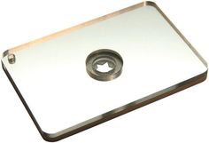 a metal plate with a hole in the middle