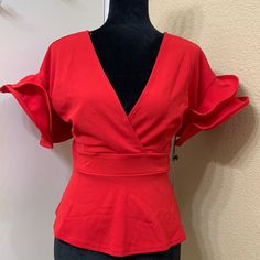 Haute Monde Raffle Sleeve Blouse .Excellent Pre-Owned .Excellent Condition No Holes Or Flaws .With Tag Approximate Measurements .Length 22” .Shoulder 20” .Bust 17” Elegant Red V-neck Blouse, Chic Formal Tops With Ruffle Sleeves, Red V-neck Top For Office, Elegant Ruffle Sleeve Tops For Night Out, Elegant Red Office Tops, Elegant Fitted Red Top, Elegant Red Ruffled Blouse, Elegant Red V-neck Tops, Fitted Ruffle Sleeve Top For Evening