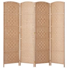 a room divider made out of wicker with four panels on each side and one panel