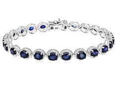 Pre-Owned 8.41ctw oval blue sapphire with .02ctw round white four diamond accents, rhodium over sterling silver bracelet. Measures approximately .27"W. Box clasp with double safety..  This product may be a customer return, vendor sample, or on-air display and is not in its originally manufactured condition.  It may not be new.  In some instances, these items are repackaged by JTV. Sterling Silver Cubic Zirconia Gemstone Bracelet, Sterling Silver Diamond Bracelet With Gemstone, Sapphire Cubic Zirconia Bracelets, Fine Jewelry With Lab-created Sapphire And Diamond Accents, Formal Sapphire Jewelry With Gemstone Accents, Sapphire Cubic Zirconia Jewelry With Polished Finish, Silver Diamond Gemstone Bracelet, Sapphire Jewelry With Diamond Accents, Sapphire Colored Cubic Zirconia Jewelry With Polished Finish