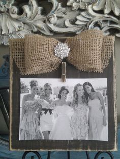 an old photo frame is decorated with burlock