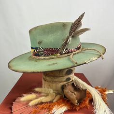 *PRICE INCLUDES $15 HAT BOX* Premium Wool Felt 4 1/4 Crown, 3 3/4 inch brim Custom Color, Distressing, Band and Accessories Dri-lex sweatband for added comfort Colors may vary slightly. Although each hat is unique a similar hat can be made in various sizes. All Sales Final Cowboy Hat Styles, Custom Cowboy Hats, Road Warrior, Felt Cowboy Hats, Painted Hats, Distressed Hat, Unique Hats, Hat Ideas, Fancy Hats