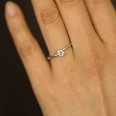 JSVConcepts Fine Jewelry Moissanite Engagement Ring, 0.24 Carat 4.0mm Round Brilliant Cut Engagement Ring, Engagement Ring with Moissanite, Proposal Promise Rings ≫ Product Details ◈ Handmade / Handcrafted Fine Jewelry ◈ Ring Thickness: 1.5mm ~ 2.0mm ◈ 4 Prong setting ◈ Moissanite Color Grade: D E F ◈ Moissanite Clarity Grade: VVS1 ◈ Cut: Brilliant Cut ◈ Metal: 14K Solid Gold (18K also available - Additional fees may apply) ◈ Gold Color: White gold, Rose gold, Yellow gold ≫ Please read our FAQ b Minimalist Moissanite Ring For Anniversary, Minimalist Moissanite Diamond Cut Rings, Minimalist Moissanite Wedding Ring, Minimalist Sterling Silver Diamond Ring With Brilliant Cut, Minimalist 14k White Gold Diamond Ring With Vvs Clarity, Minimalist Moissanite Diamond Ring With Vvs Clarity, Minimalist Moissanite Diamond Ring As Gift, Minimalist Moissanite Diamond Ring With Tension Setting, Minimalist Moissanite Diamond Ring Gift