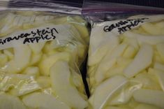 there are two bags of apples that have been wrapped in plastic and labeled with the same name