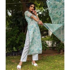 Make an everlasting impression at any upcoming festive occasion in our beautiful chanderi kurta set comprising a cotton pants. The kurta set features a round neckline, and lace at the front neck ,elbow sleeves, and printed organza dupatta. Pair it with traditional chaandbali earrings and pearl earrings to complete the overall look . SKU#: 11403217GR Disclaimer: There may be slight difference in actual product color compared to product images. Anarkali Cotton Silk Kurta For Spring, Spring Anarkali Cotton Silk Kurta, Spring Chanderi Palazzo Set With Straight Kurta, Designer Wear Spring Kurta With Set-in Sleeves, Designer Spring Kurta With Set-in Sleeves, Spring Bollywood Style Cotton Silk Palazzo Set, Spring Bollywood Cotton Silk Palazzo Set, Chanderi Traditional Straight Kurta For Spring, Spring Chanderi Traditional Wear Straight Kurta