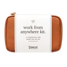 Our new Work From Anywhere Kit is a little tech, a little office, a little personal care, and a whole lot of convenience. The cognac vegan leather pouch with mesh zipper pockets contains 18 essentials: Notepad and sticky flags, pen, stain removing towelettes (2), microfiber cloth, phone/tablet stand, lip balm, breath drops, pain reliever (2), cord organizer, 2-in-1 charging cable, wall charger, cleaning tool, hand cleaning towelettes (2), and password hint list. Material: Cognac vegan leather Sh Desk Things Products, Nee Job Gifts, New Job Gift For Him Business, Work From Home Tools, Gifts For Hardworking Men, Best Work Christmas Gifts, Cognac Bag, Work From Anywhere, Work Essentials