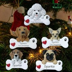 christmas ornament with dogs on them and their names in the shape of bones