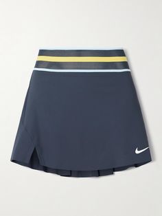 Nike's 'Slam' tennis skirt is designed with considered details to help boost your performance on the court. Cut from moisture-wicking Dri-FIT, it has a mesh waistband for ventilation and internal shorts that provide comfort and coverage. Stretch Nike Tennis Skirt With Lining, Sporty Skirted Tennis Bottoms, Sporty Lined Skort For Sports, Sporty Skirt For Sports, Nike Stretch Tennis Skirt With Lining, Nike Stretch Tennis Skirt With Lined Skirt, Sporty Skirted Tennis Dress For Sports, Blue Athleisure Skirt For Sports, Athleisure Sports Skirt In Blue