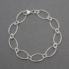 Hey, I found this really awesome Etsy listing at https://www.etsy.com/listing/483368672/oval-round-chain-bracelet-sterling Silver Bracelet Chain, Silver Smithing, Sterling Silver Jewelry Rings, Silver Link Bracelet, Black Beaded Bracelets, Silver Jewelry Design, Silver Chain Style, Bracelet Chain, Onyx Bracelet